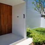 Main entrance White villa with teak wood bleached and oiled white Magic oil 2k
